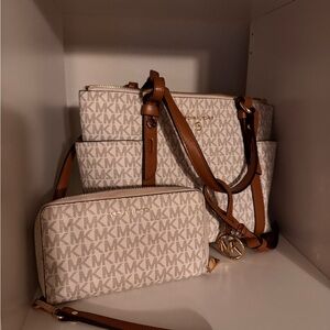 Michael Kors Cream Crossbody Bag with Elegant Design and Gold Charm